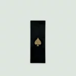 Luxurious black box of Armand De Brignac Brut Gold Champagne, designed with sleek lines and a glossy finish.