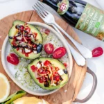 Balsamic Vinegar 3 Gold Medals Organic Champagnotta next to avocado salad