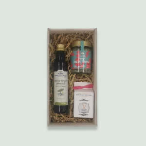 a healthy gift box containing luxury organic Greek Evoo, vasilissa organic raw honey, and organic herbs or essential oils from Lavandia.