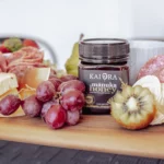 Manuka honey on a cheese board