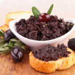 Marfuga Black Olive Spread on Sandwich
