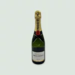 Front view of Moët Impérial Champagne bottle with golden label.
