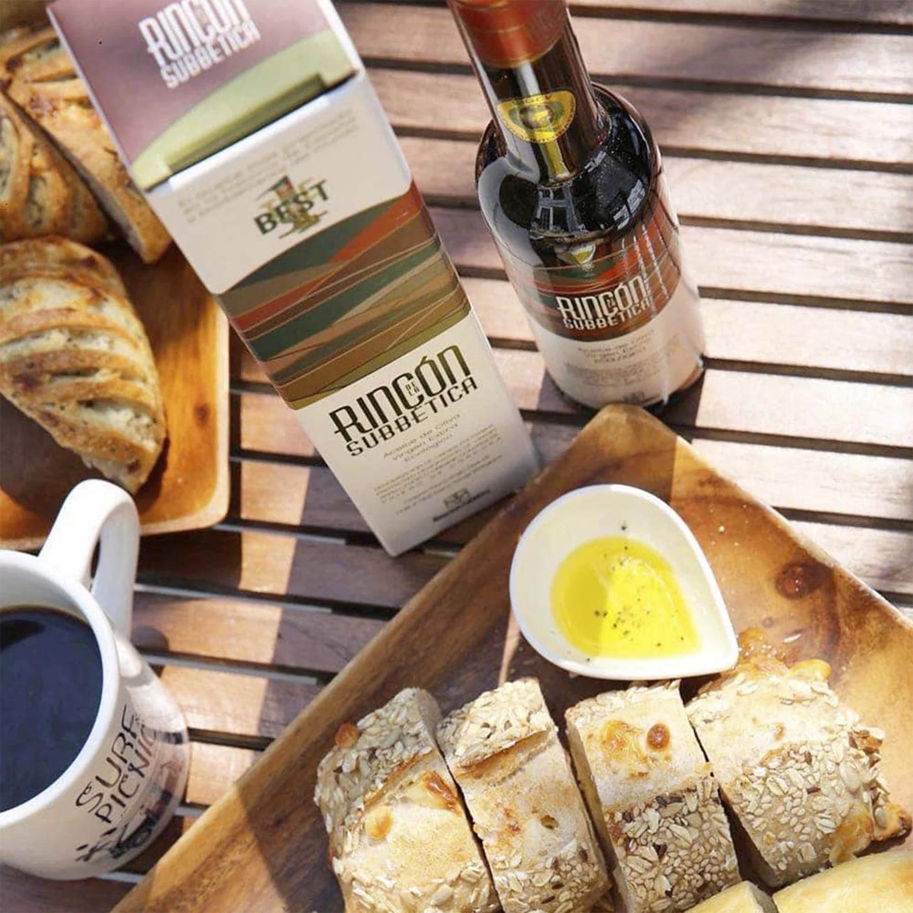 Fresh rustic bread drizzled with Rincón de la Subbética olive oil Fresh rustic bread drizzled with Rincón de la Subbética olive oil