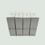 Side view of The Governor Premium EVOO Limited Edition Pack, displaying four 500ml bottles of premium olive oil with a distinctive design.