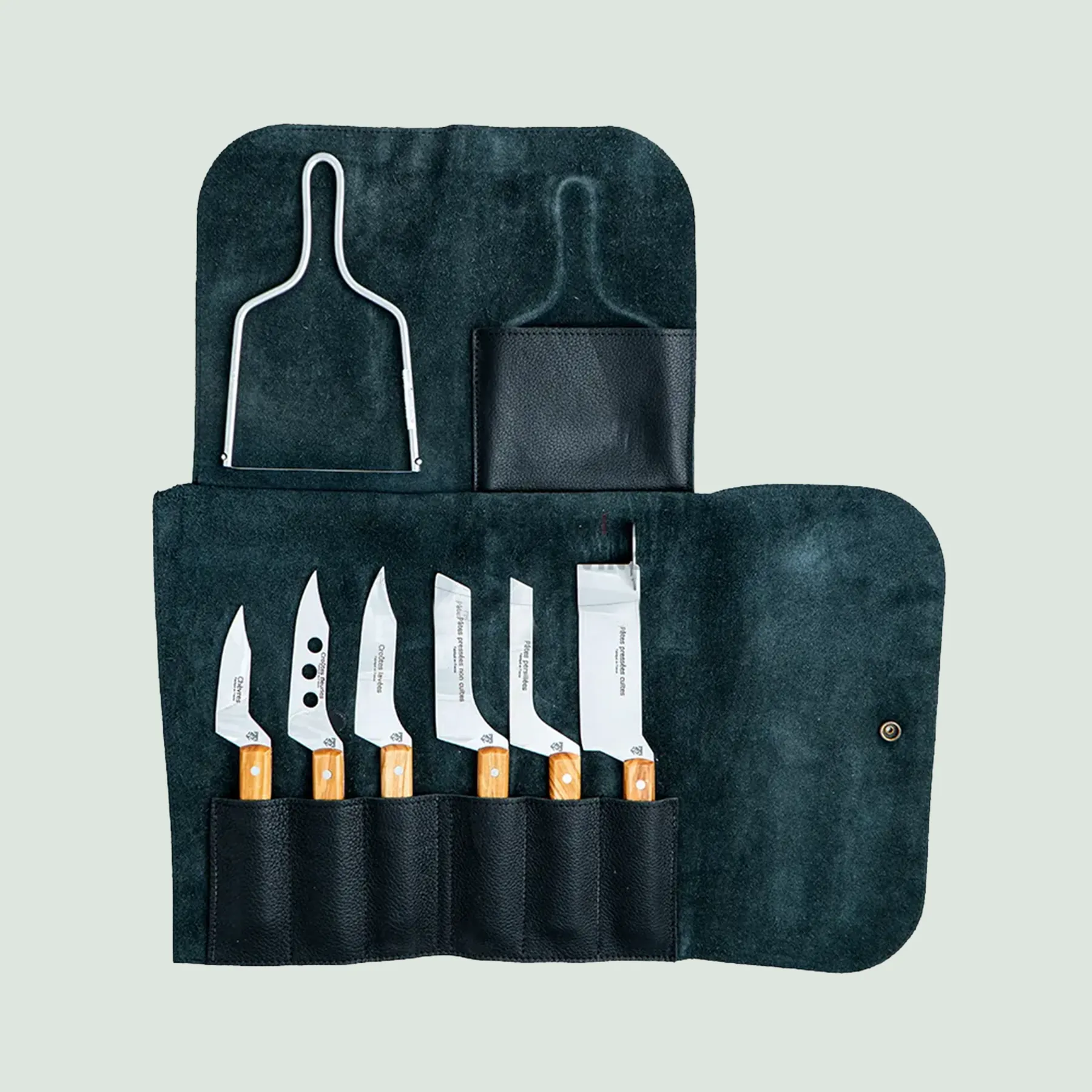 Set of six cheese knives and foie gras lyra with olive wood handles in leather case