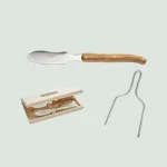 Foie gras lyra knife with olive wood handle and stainless steel bolster, close-up