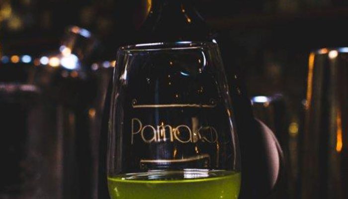 Pamako high phenolic evoo in Glass - vivid green color